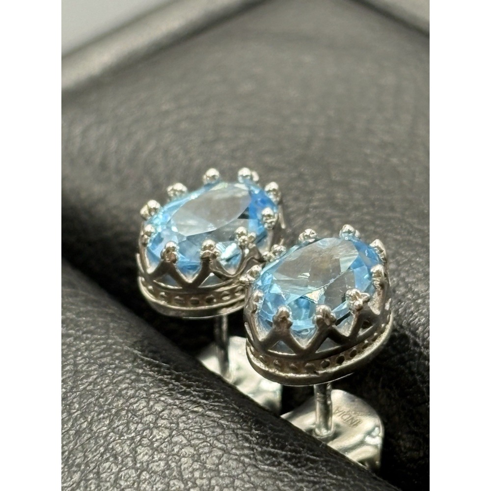 New Condition Sterling Silver Genuine Blue Topaz 7x5MM Stud Earrings F2